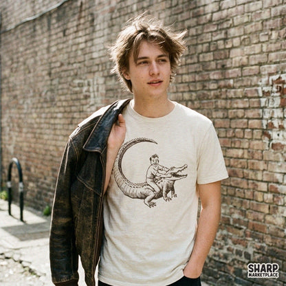 Funny vintage drawing of a boy riding an alligator in a swamp scene PNG graphic for t-shirt sublimation and print on demand