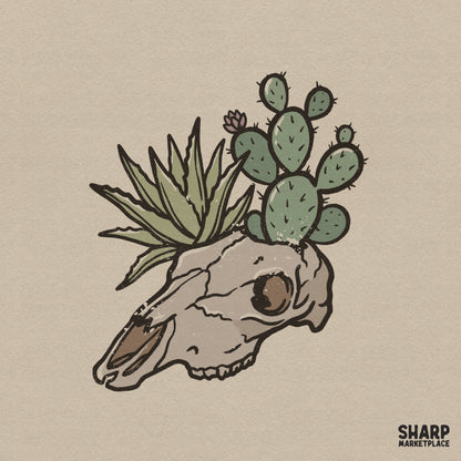 Western boho digital design featuring a cow skull planter with a green prickly pear cactus and spiky aloe succulent in muted earth tones for apparel.
