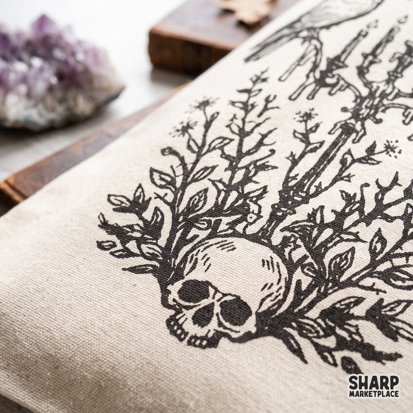 Gothic raven perched on a candelabra over a floral skull for spooky season halloween shirts and dark academia decor png