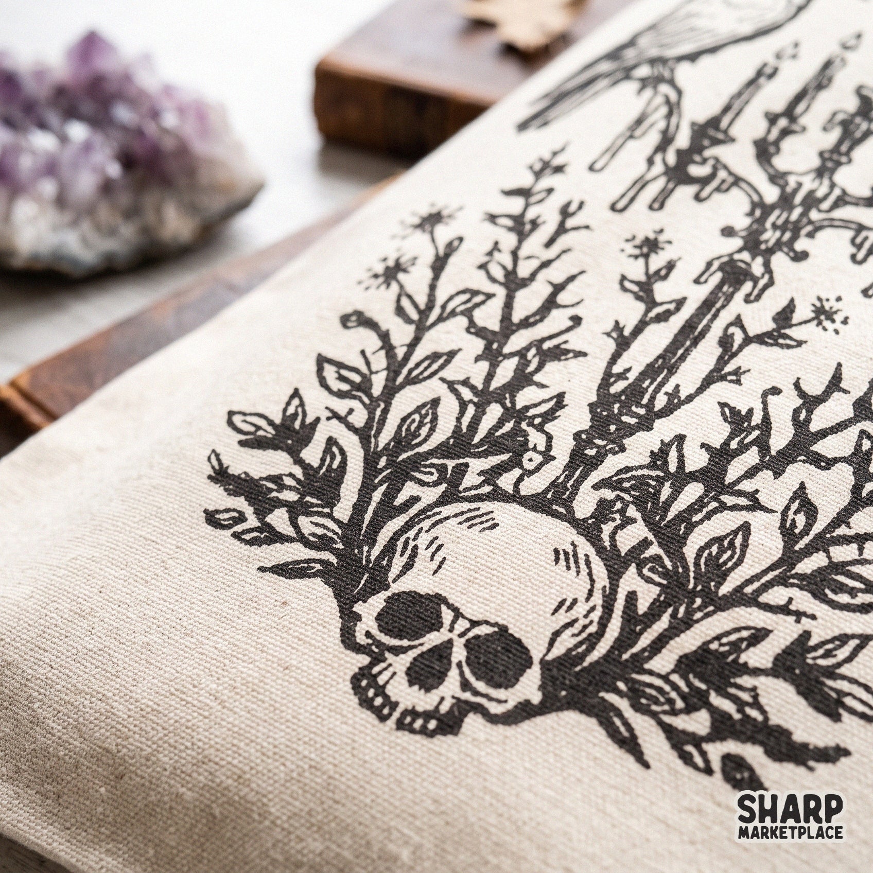 Gothic raven perched on a candelabra over a floral skull for spooky season halloween shirts and dark academia decor png