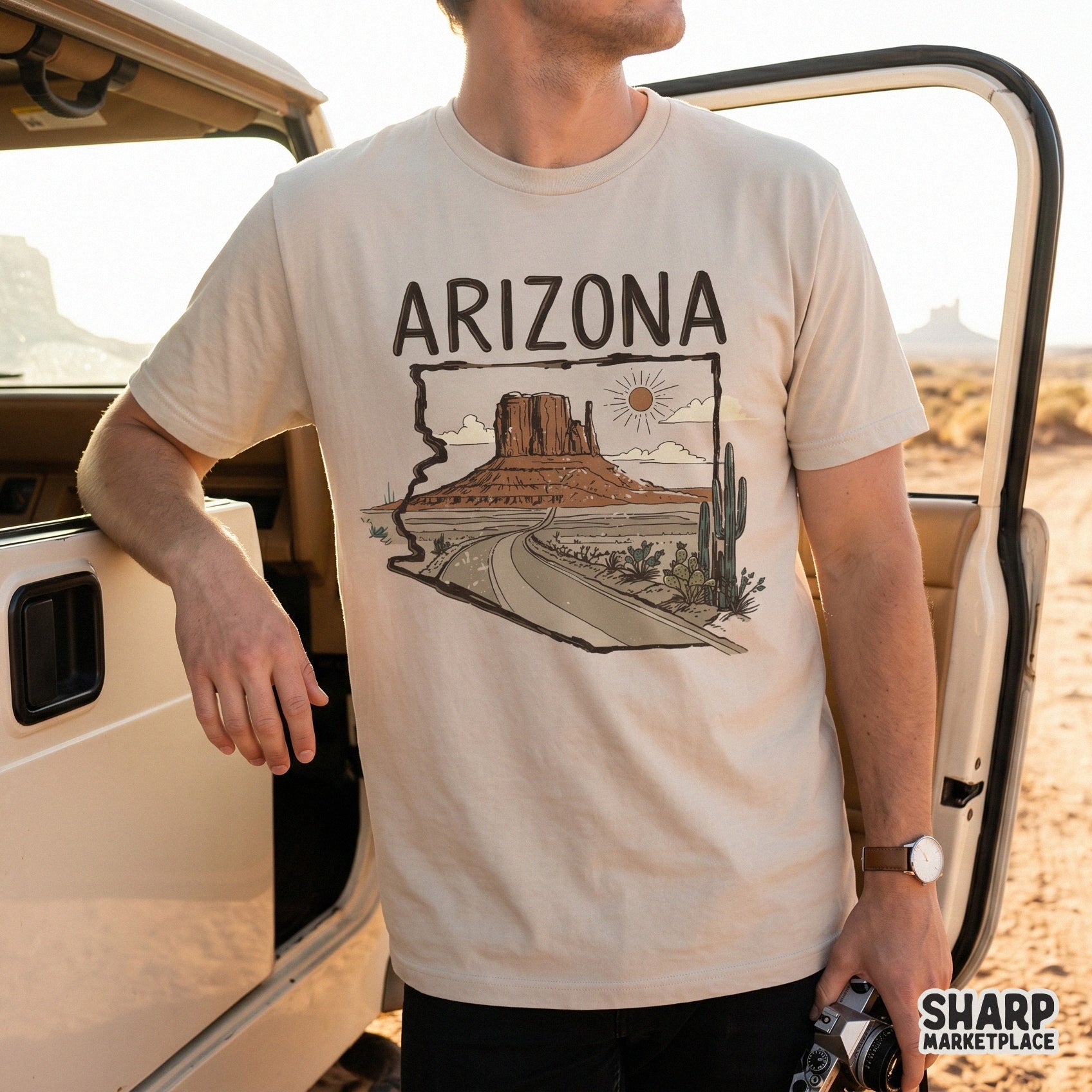 Digital sublimation design of a desert road trip through Arizona, showcasing state borders, monument-style rock formations, and desert flora.