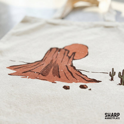 Earthy desert mesa and cactus illustration with a nostalgic aesthetic, suitable for print-on-demand projects, heat transfers, and DIY craft items.