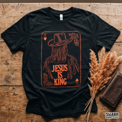 Jesus Is King western PNG shirt design with retro Christian cowboy playing card graphic for shirts and apparel