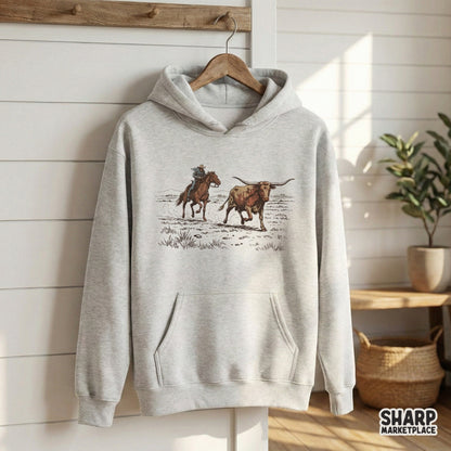 Detailed digital design of a rancher and longhorn steer in a dusty western landscape, perfect for rodeo-themed sublimation or custom shirt projects.