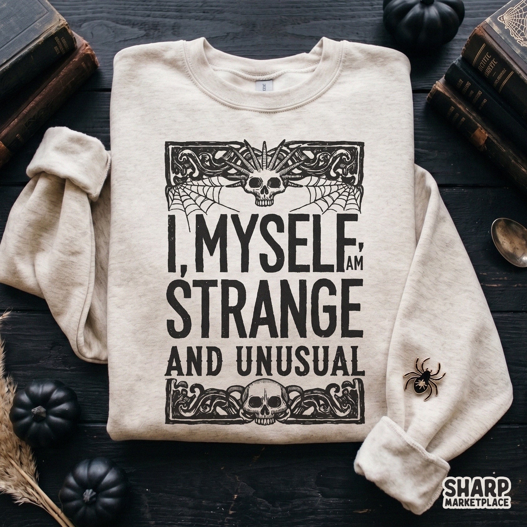 Retro Beetlejuice inspired skull with spiderwebs and I Myself Am Strange And Unusual text for Halloween sublimation shirts