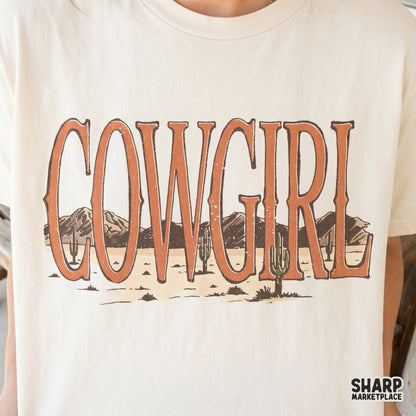 Vintage inspired Cowgirl lettering design with a desert landscape fill, suitable for creating custom western themed tumblers, stickers, and shirts.