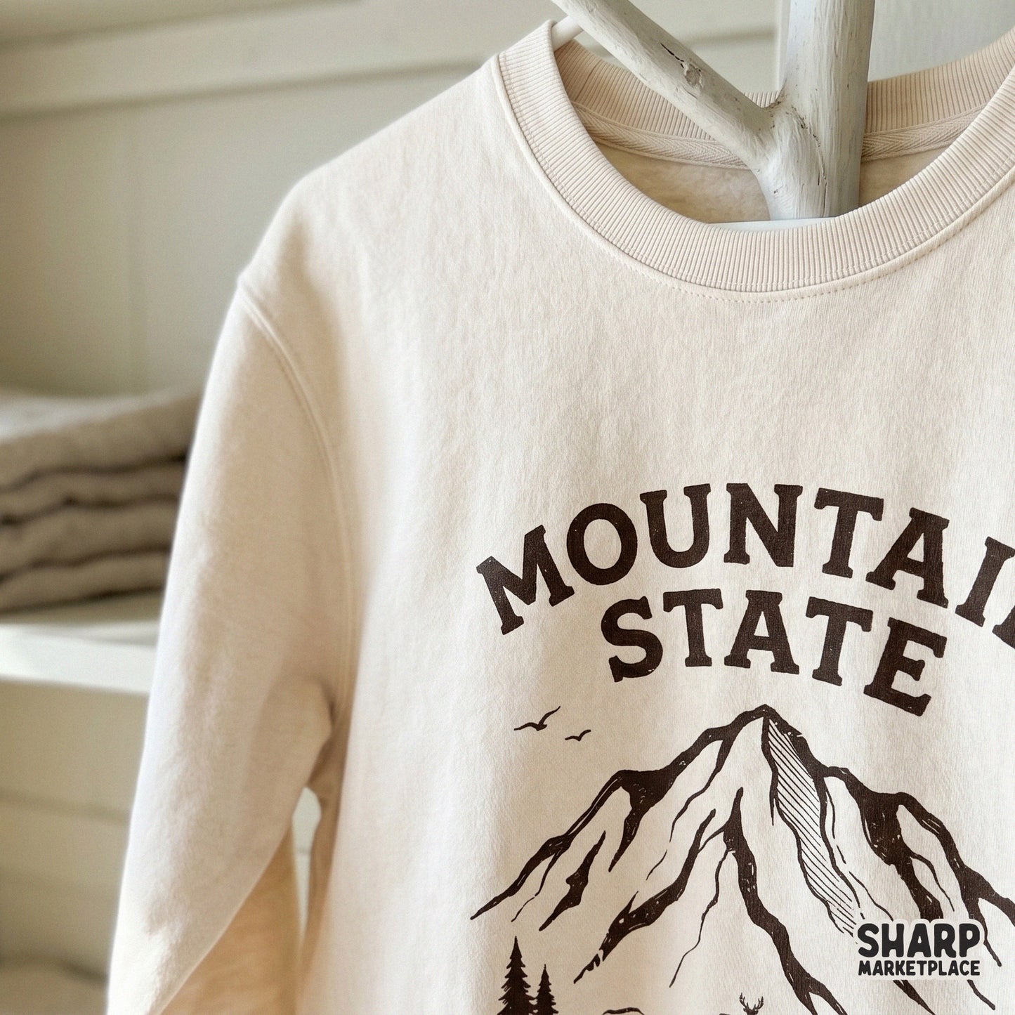 Vintage-style mountain landscape digital art with the phrase Breathe Wild, suitable for hunting gear, camping apparel, and rustic wall art prints.