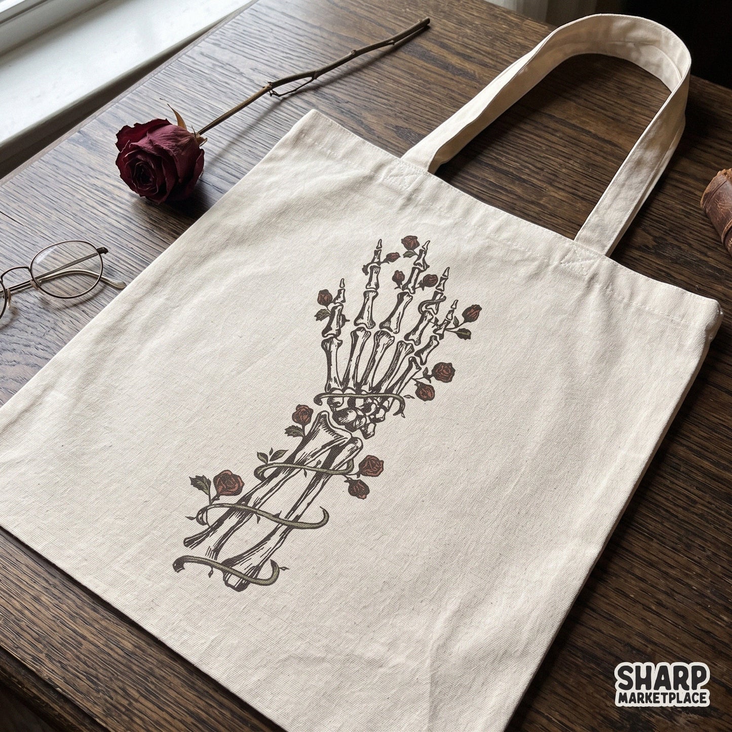 Gothic skeleton hand holding red roses halloween png design for t-shirt sublimation and apparel printing