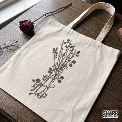 Gothic skeleton hand holding red roses halloween png design for t-shirt sublimation and apparel printing