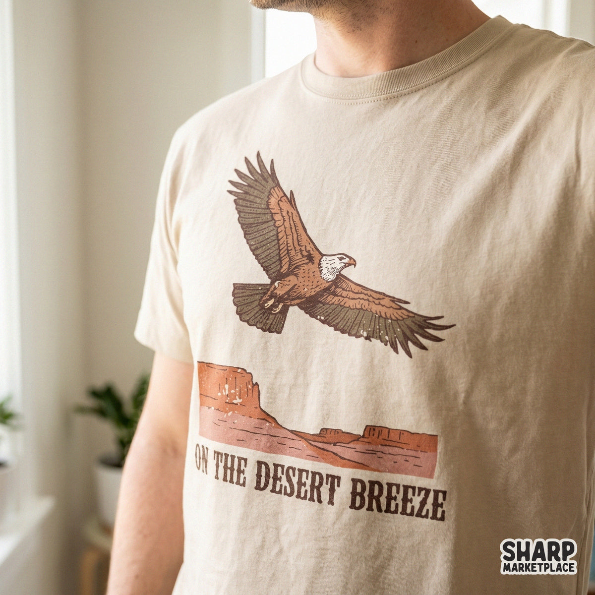Southwest desert scene design with a detailed eagle in flight over a red rock mesa, suitable for DTF printing, sublimation, and custom clothing.