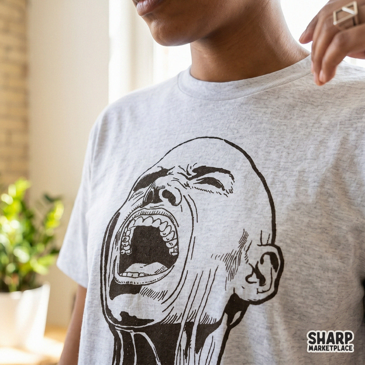 Surrealist screaming head line art with deep shading, designed as a versatile transparent PNG for print-on-demand apparel and alternative wall art.