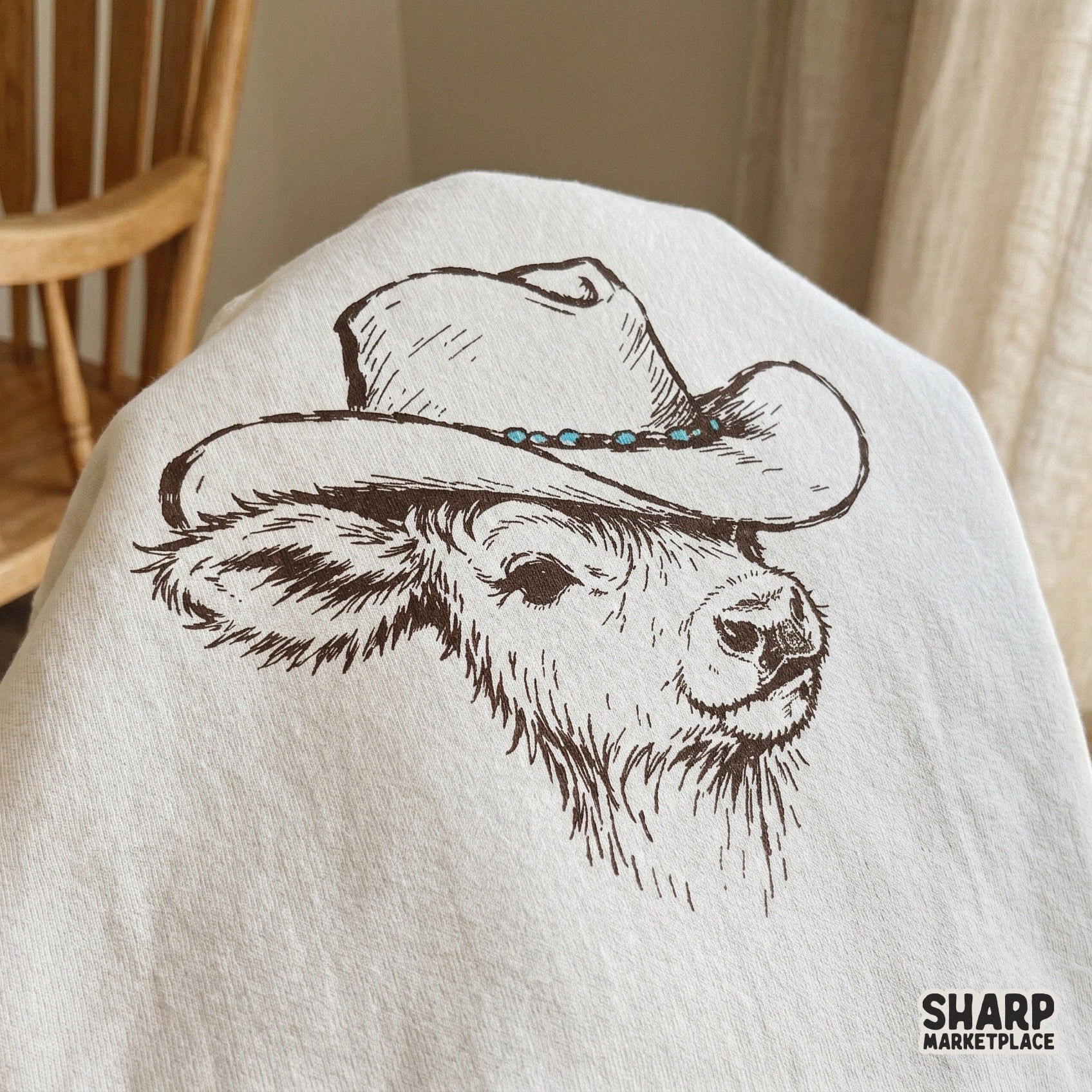 Rustic western-style digital graphic of a baby highland cow in a cowboy hat, ideal for creating custom ranch-themed shirts, stickers, and tumblers.