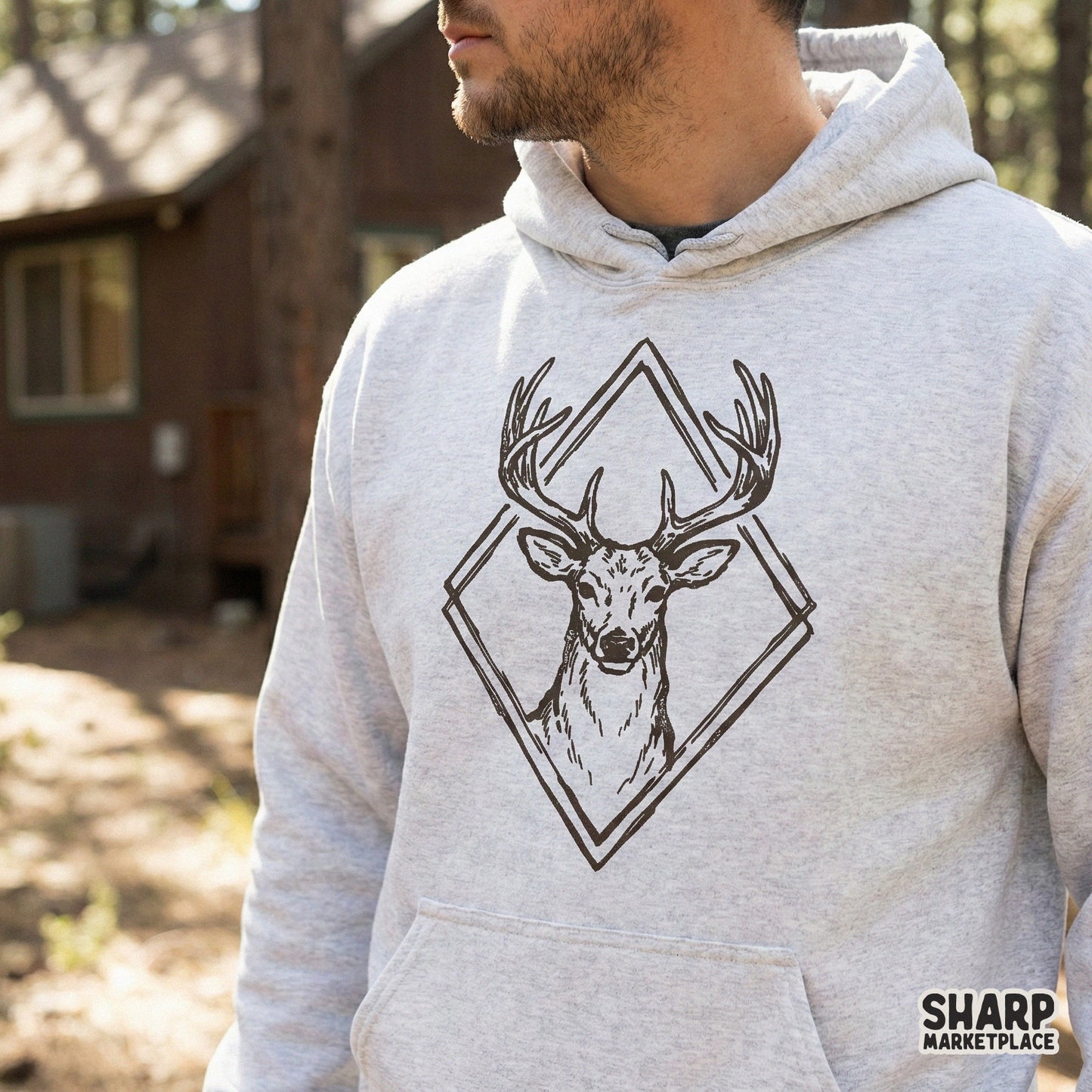 Hand-drawn stag illustration with a distressed vintage aesthetic, ideal for forest themed wall art, cabin decor, or custom apparel design projects.