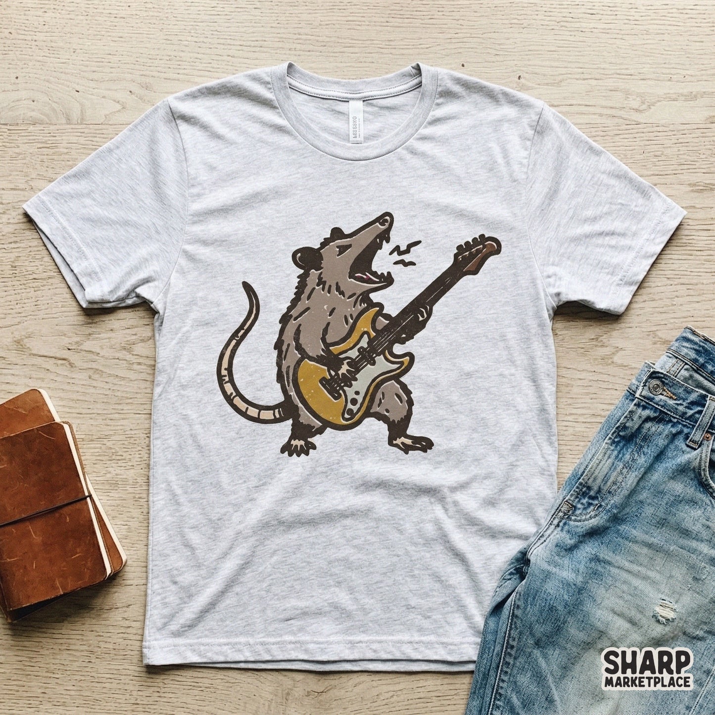High-resolution digital download featuring a gritty, hand-drawn opossum playing an electric guitar, ideal for DTF printing and trendy shirt designs.