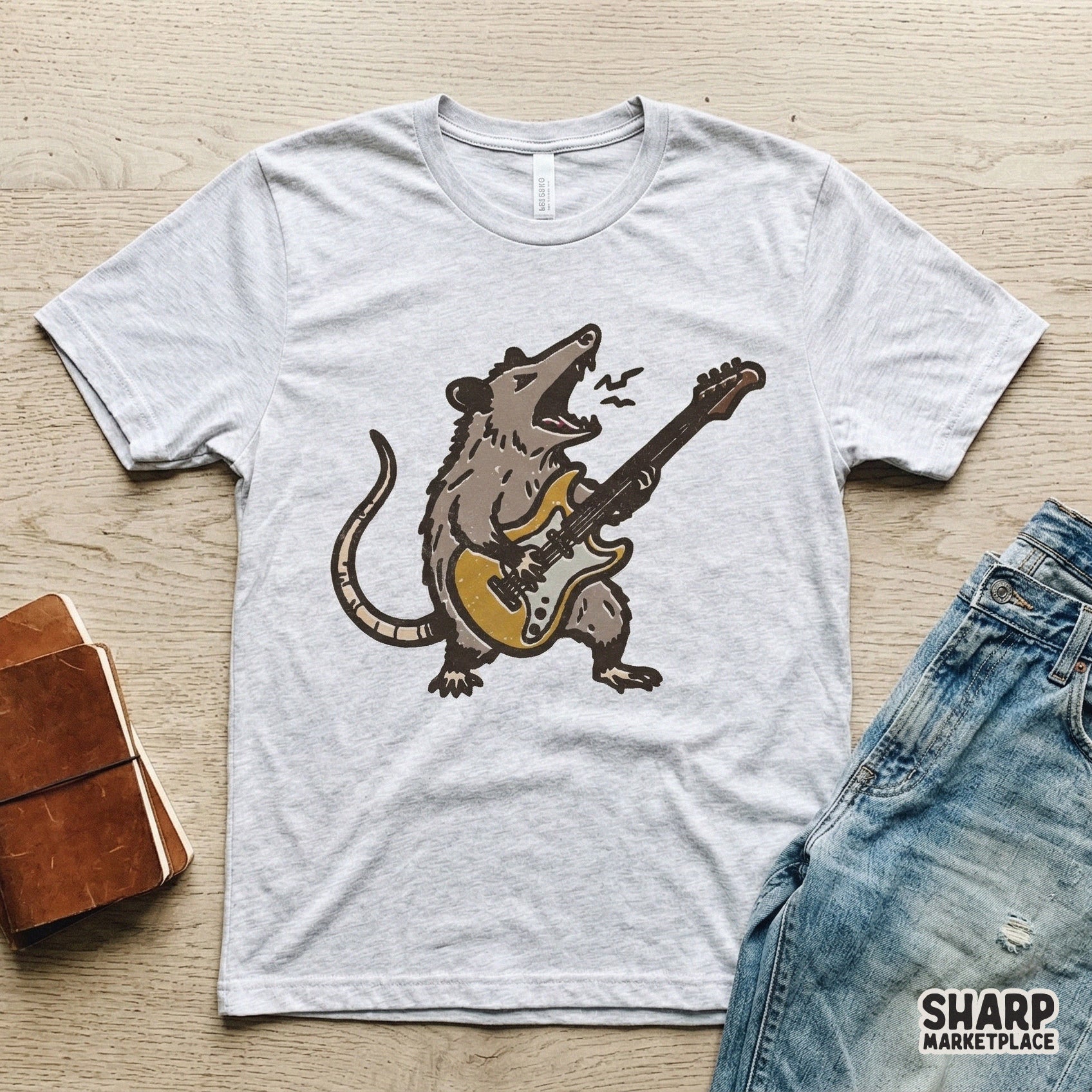 High-resolution digital download featuring a gritty, hand-drawn opossum playing an electric guitar, ideal for DTF printing and trendy shirt designs.
