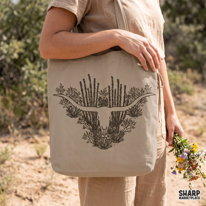 Vintage desert landscape inside a bull skull with saguaro cactus for western cowboy shirt PNG designs