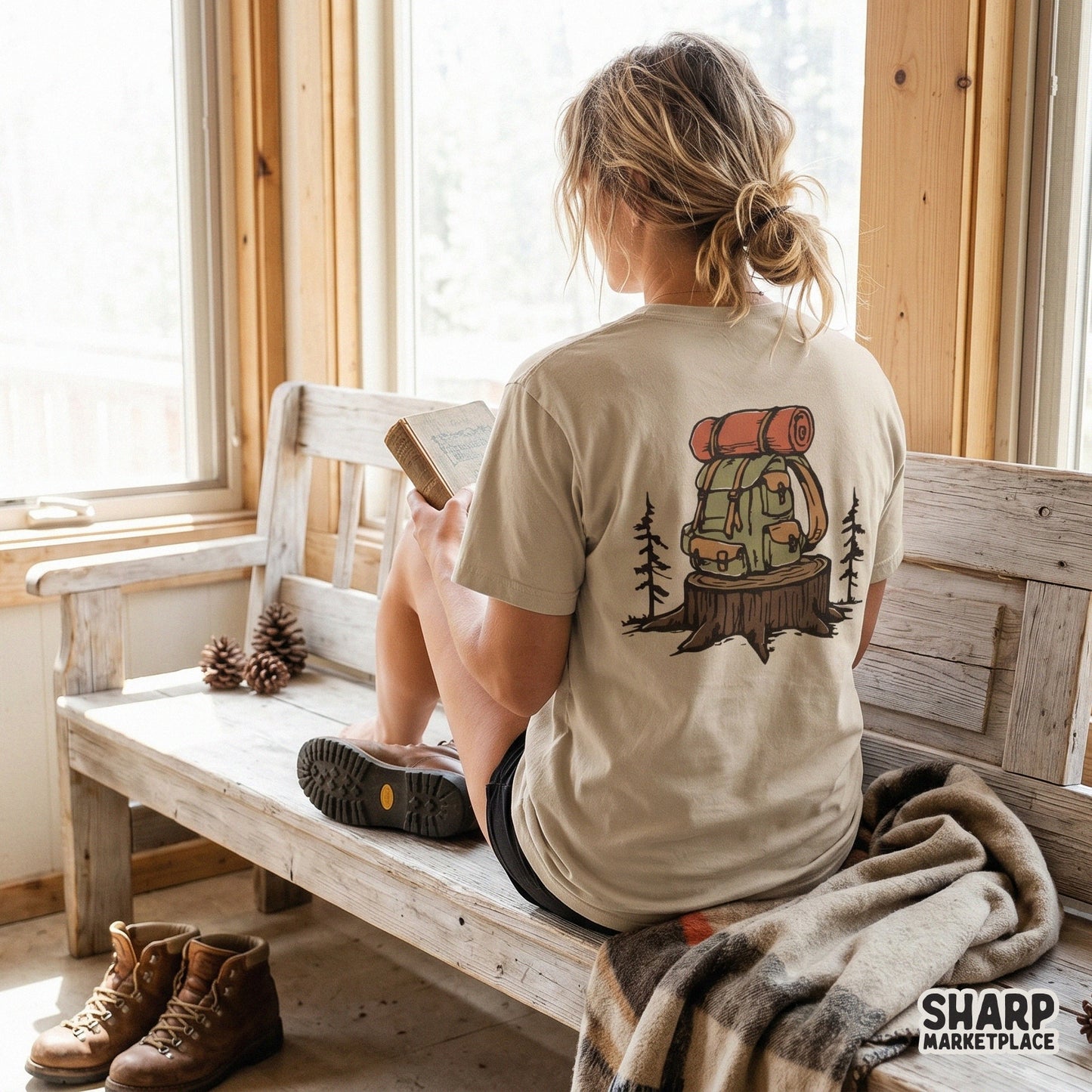 Rustic outdoor adventure graphic showing a trail pack on a stump with pine silhouettes, ideal for nature-themed apparel and DIY craft projects.