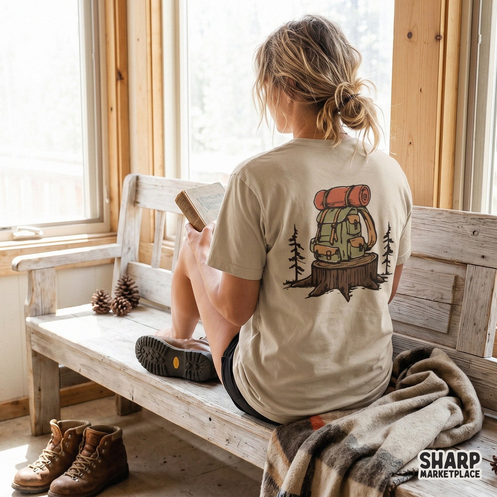 Rustic outdoor adventure graphic showing a trail pack on a stump with pine silhouettes, ideal for nature-themed apparel and DIY craft projects.