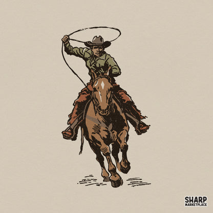 Vintage style cowboy on horseback swinging a lasso, featuring earthy brown and muted green tones for western themed apparel or sublimation projects.