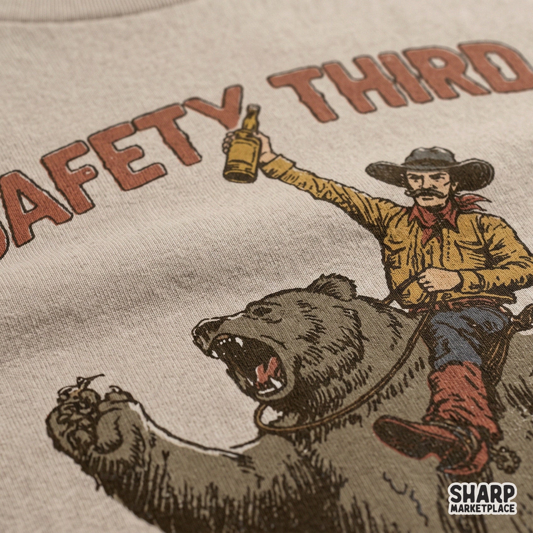 Funny cowboy riding a bear with Safety Third text in a retro western style for camping and drinking humor shirts