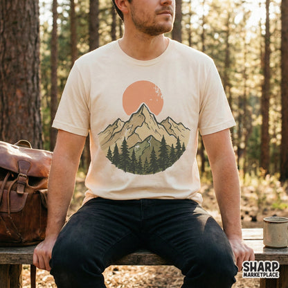 Distressed mountainscape digital art with a circular forest and peak design, ideal for creating rustic hiking shirts, stickers, and outdoor wall art.
