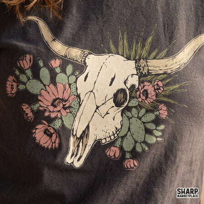 Boho floral cow skull and cactus illustration, vintage desert steer PNG design ideal for western t-shirts and sublimation