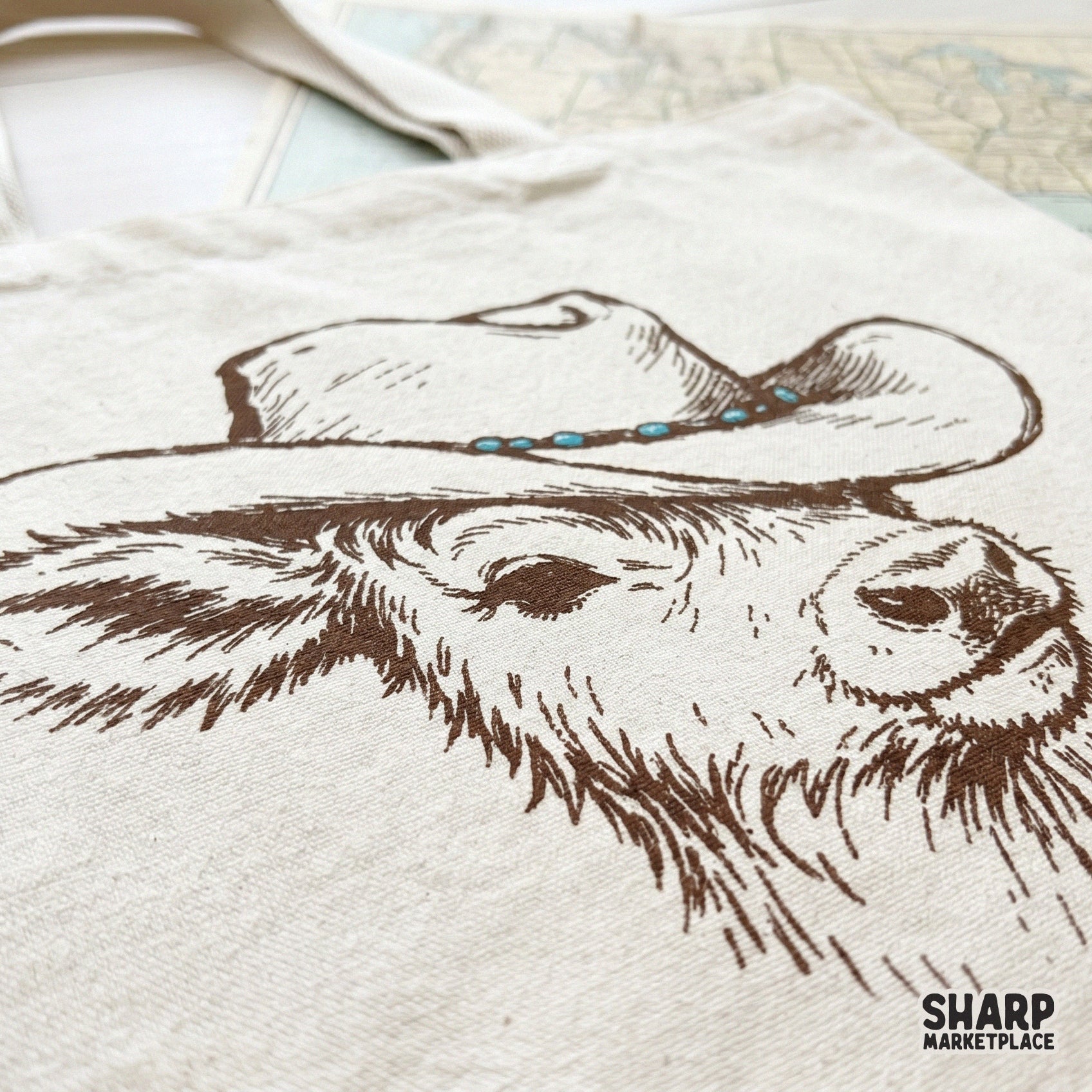 Vintage-inspired sketch of a calf wearing a western hat with turquoise accents, designed as a high-resolution PNG for print-on-demand and craft projects.