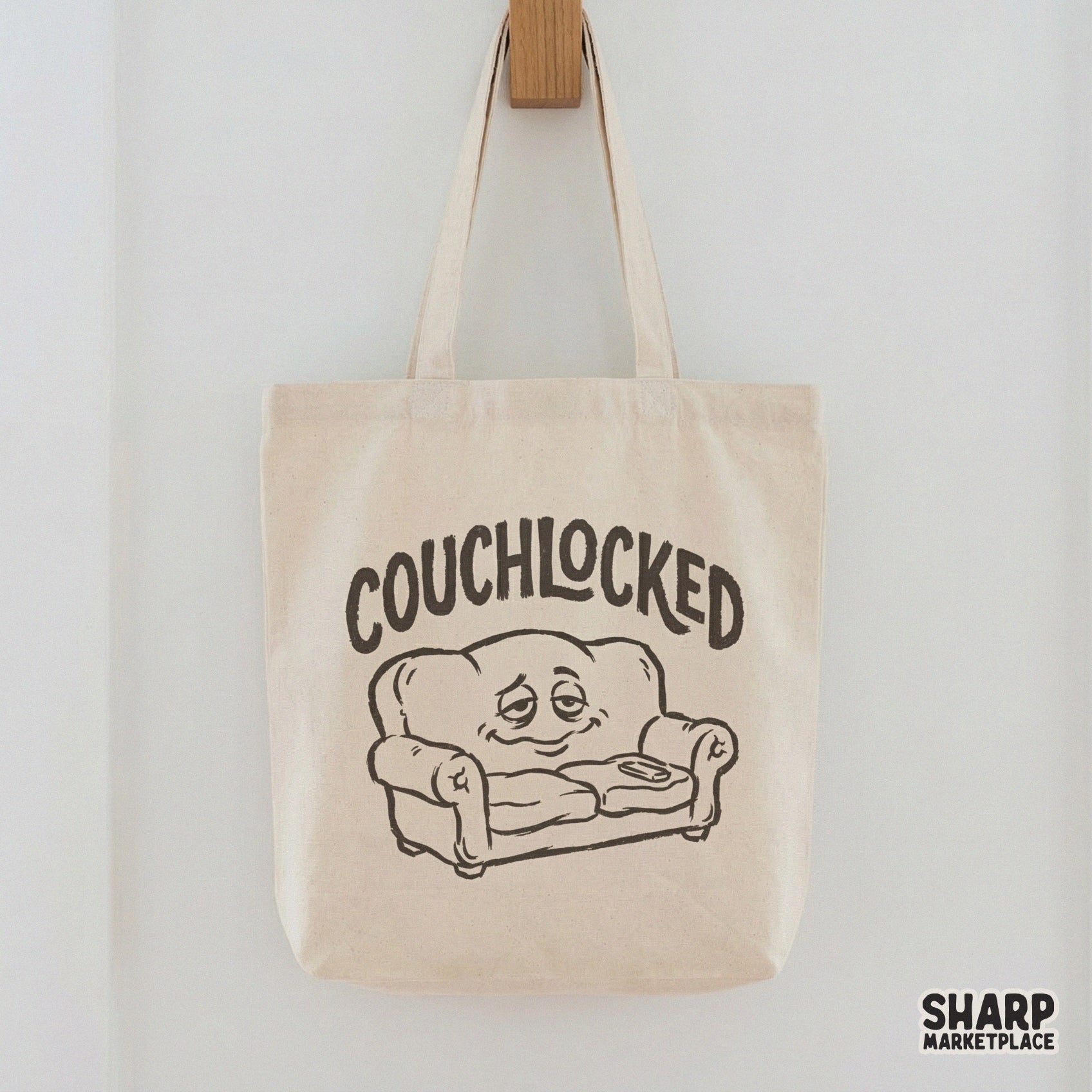 Monochromatic graphic of a stoned sofa character with arched typography, suitable for DTF printing, heat transfers, or DIY streetwear shirt projects.