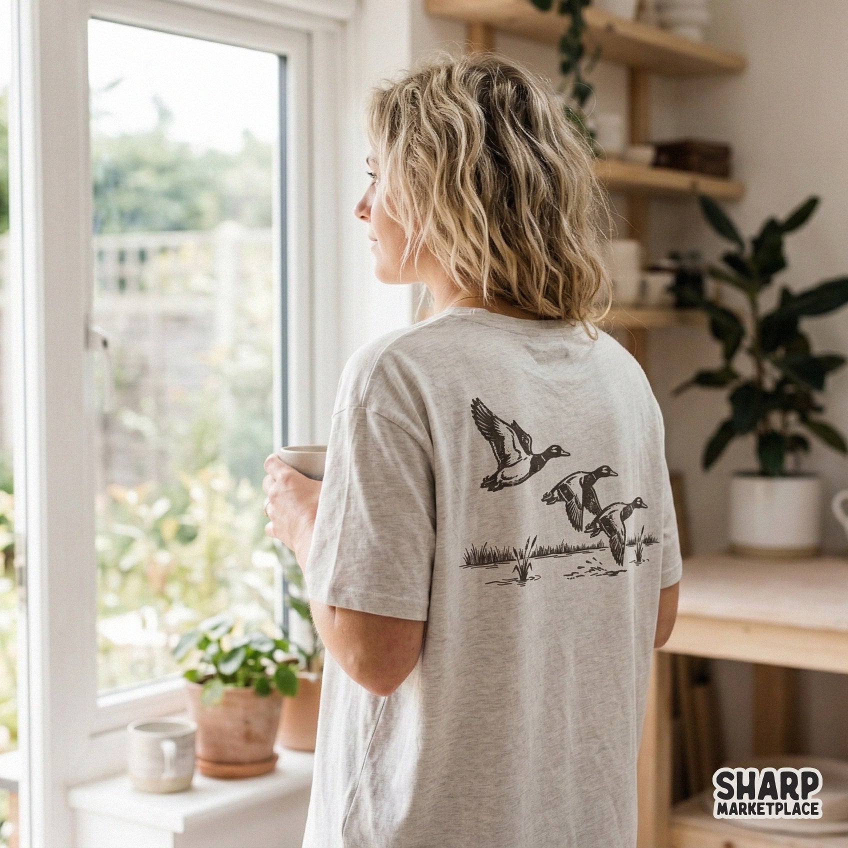 Monochromatic waterfowl flight design featuring a trio of ducks and marsh reeds, ideal for creating rugged graphic tees, tumblers, and nature-inspired art.