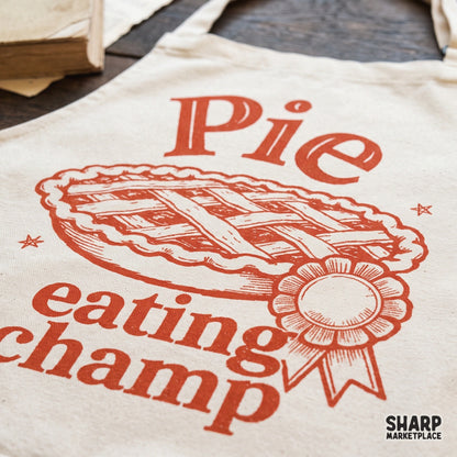 Retro pie eating champ award ribbon design for Thanksgiving shirts and autumn themed DIY crafts