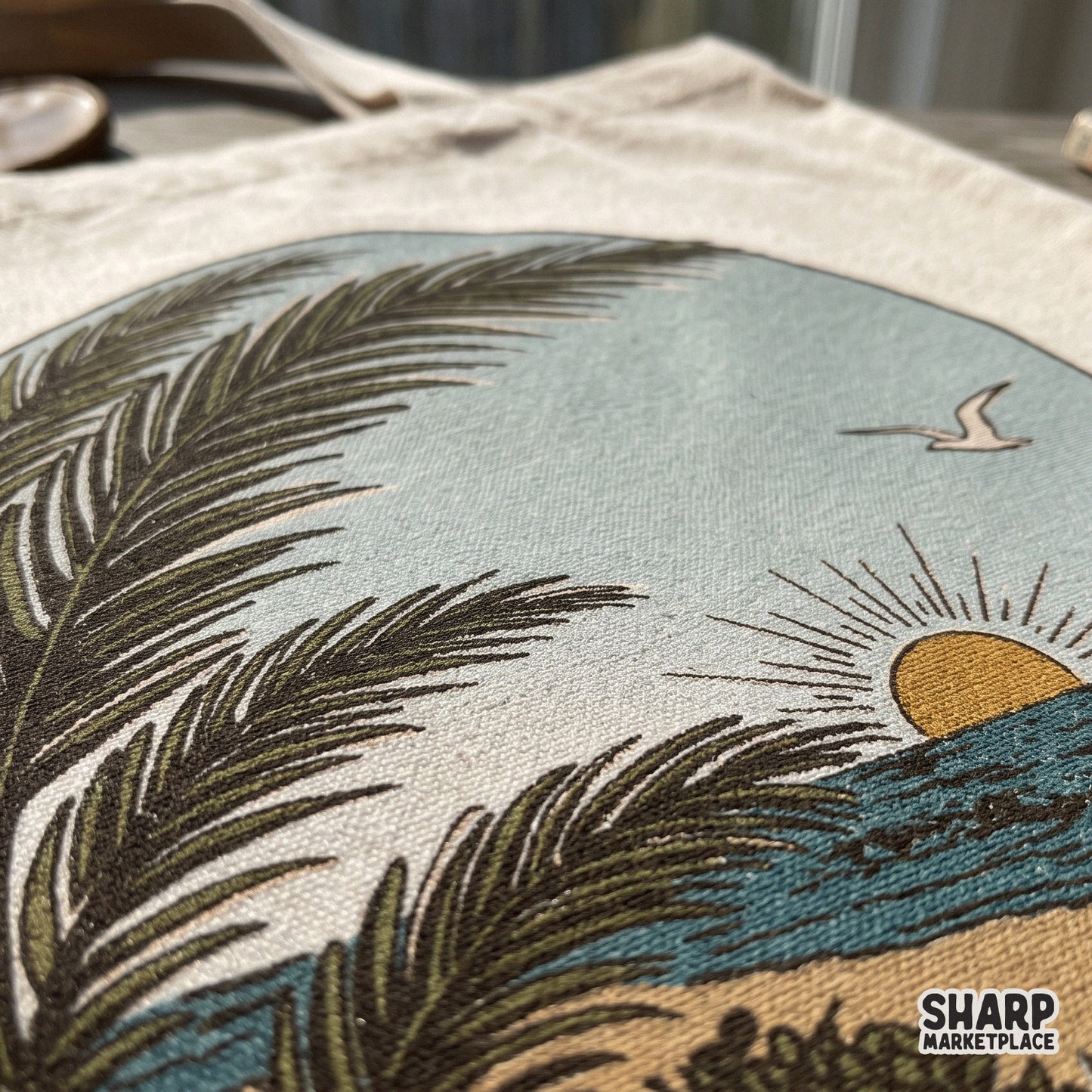 Retro beach circle landscape featuring an ocean sunrise and palm frond for summer t-shirts and Puerto Rico cruise trip gear