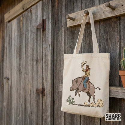 Whimsical western art of a cowboy riding a wild hog, designed for DIY projects like tumblers, apparel, and wall art with a rugged, hand-drawn style.