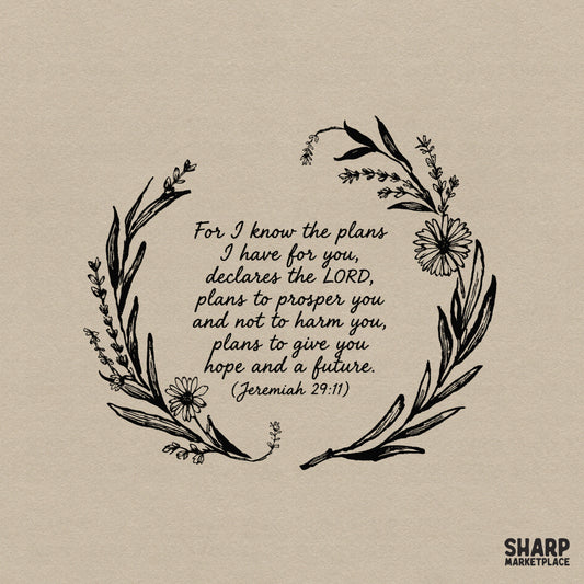 Black and white Jeremiah 29:11 scripture design featuring elegant cursive and block lettering framed by a delicate botanical wildflower wreath.