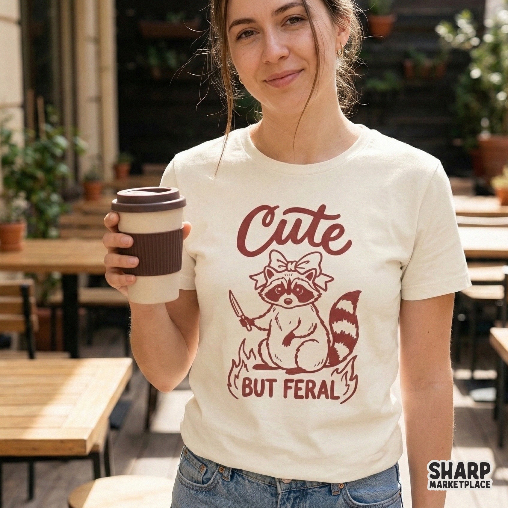 Digital download design featuring a funny raccoon holding a knife, styled with a dainty bow and campfire, ideal for sarcastic apparel or stickers.