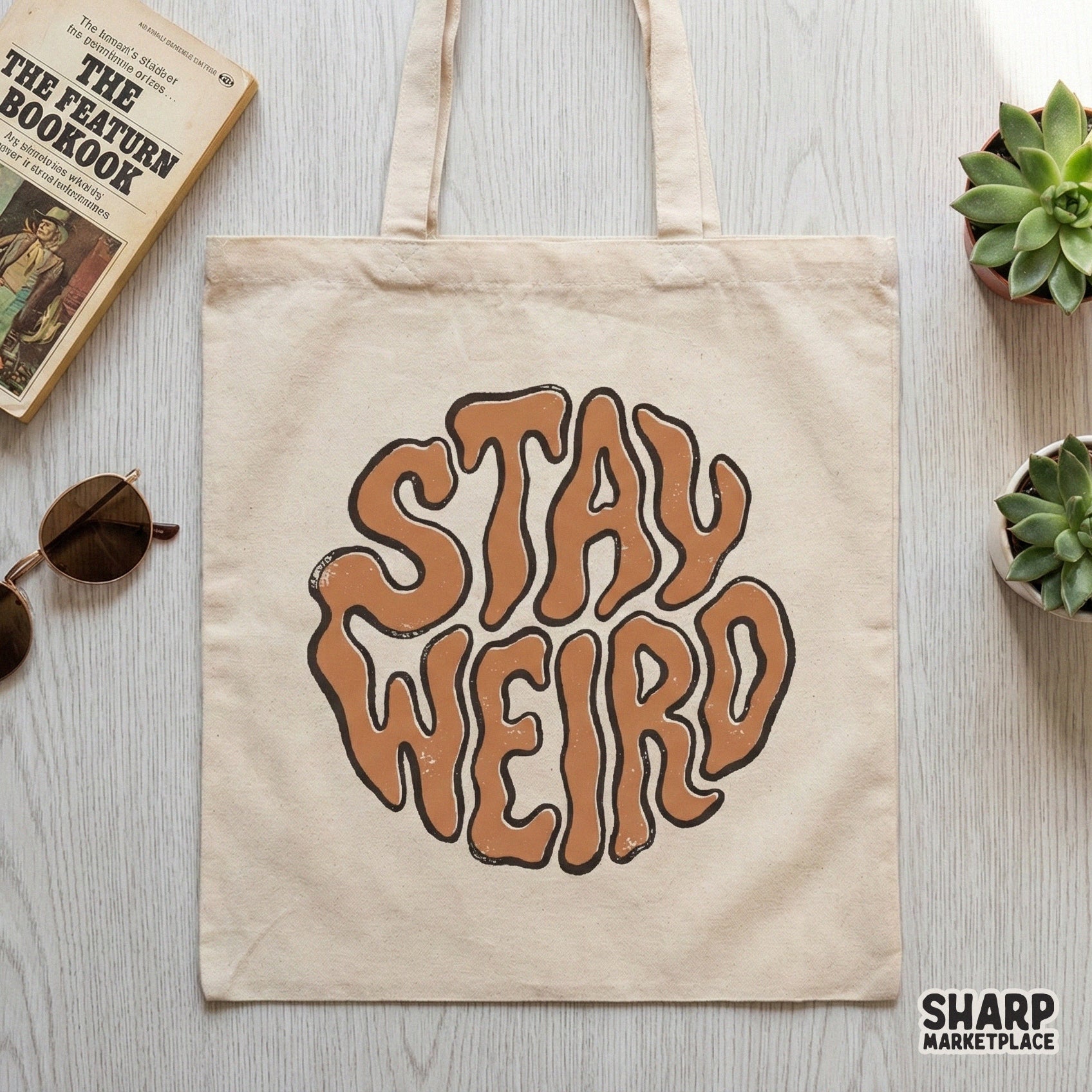 Distressed vintage-style Stay Weird typography in a circular shape, featuring psychedelic wavy brown letters for custom stickers, tumblers, or shirts.