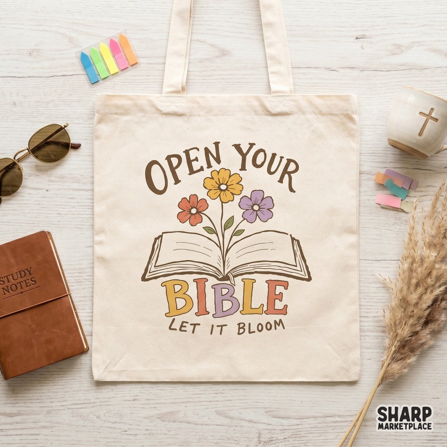 Vintage-style open Bible graphic with spring flowers and playful typography, ideal for Christian apparel, sublimation, and custom home decor.