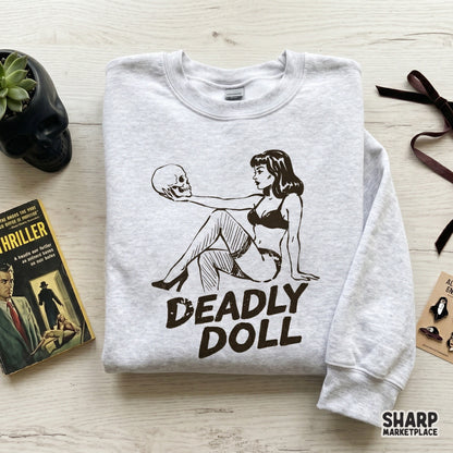 Gothic pinup girl holding a skull with bold distressed typography for dark humor sublimation designs and spooky Halloween apparel.