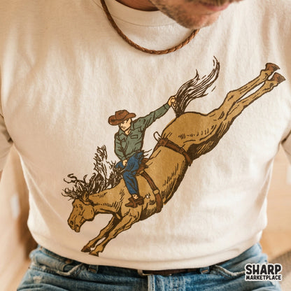 Vintage Cowboy Riding Bucking Bronco PNG for Western rodeo graphic tees and wild west country music apparel design