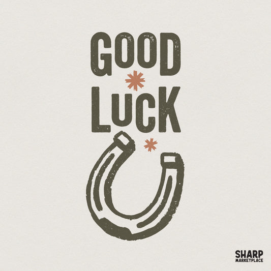 Vintage Good Luck text graphic with a distressed horseshoe illustration, earthy olive green and burnt orange colors, perfect for retro apparel designs.