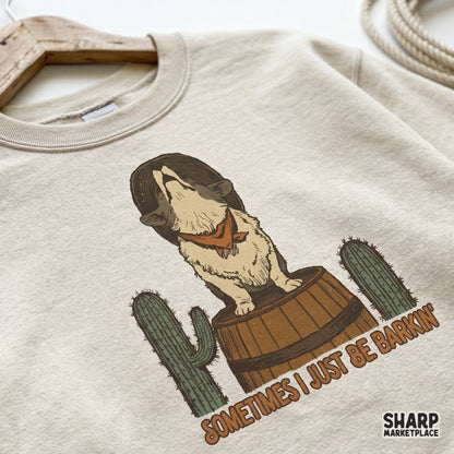 Howling corgi dog wearing a cowboy hat on a barrel funny western shirt png graphic