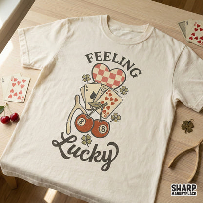 Vintage style Feeling Lucky digital graphic on a cream t-shirt mockup, showcasing a checkered heart, playing cards, and lucky charms for DIY projects.