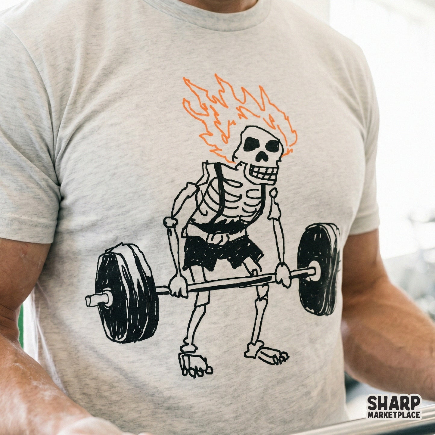 Sketchy black and orange illustration of a flaming skull deadlifting a barbell, ideal for trendy workout apparel and fitness stickers.