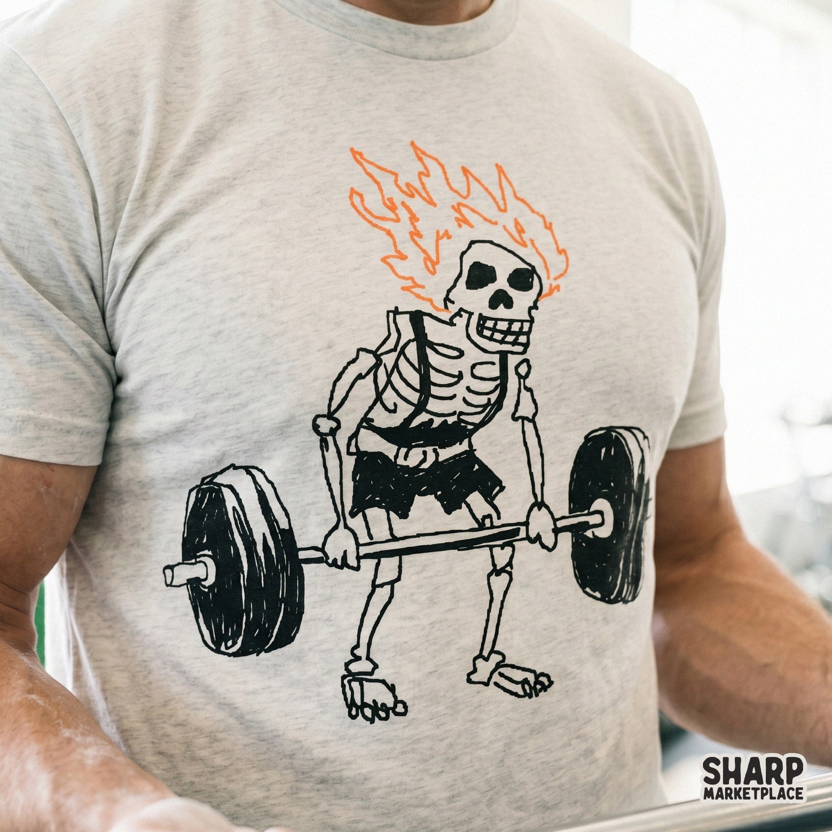 Sketchy black and orange illustration of a flaming skull deadlifting a barbell, ideal for trendy workout apparel and fitness stickers.