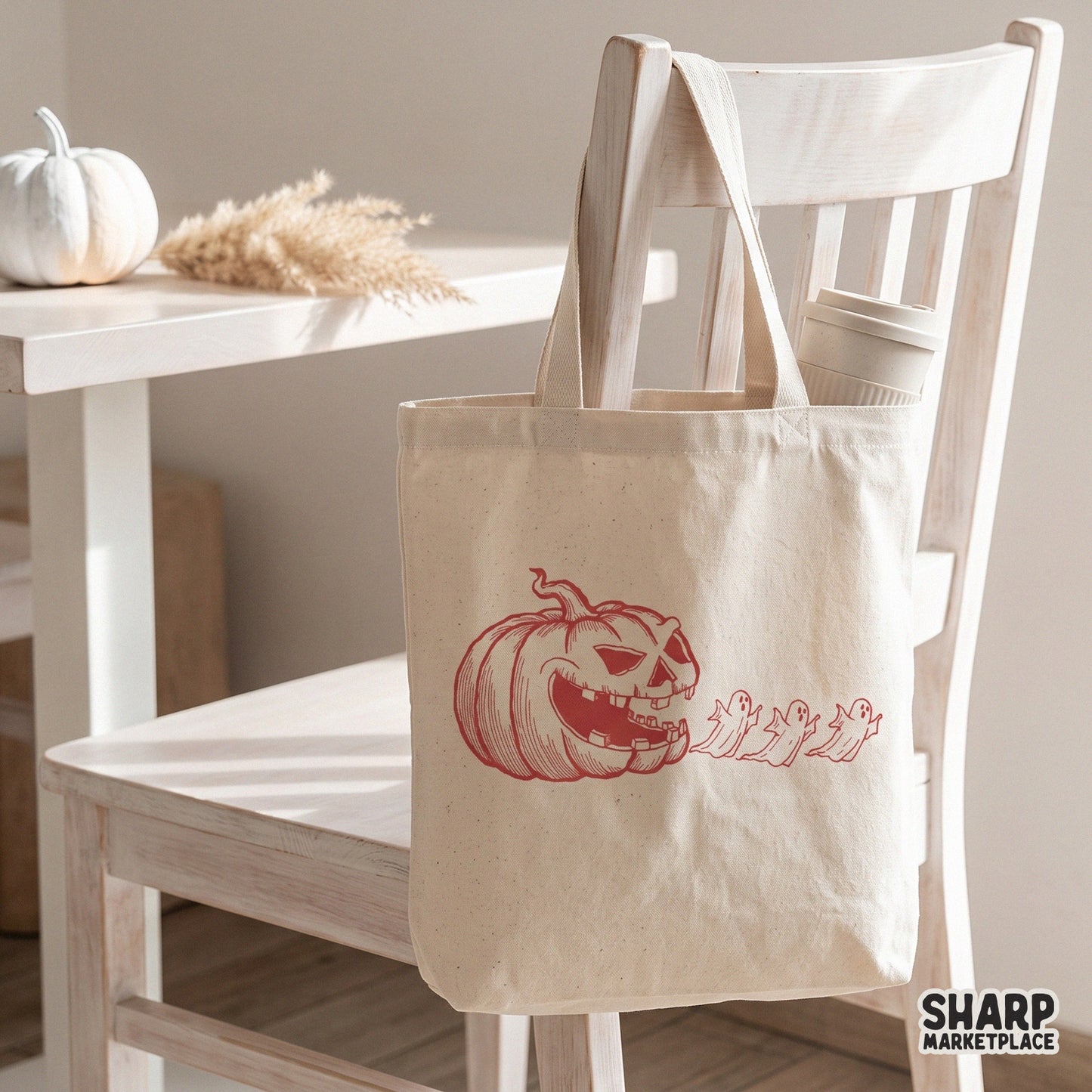 Red monochrome retro jack o lantern spitting spooky ghosts for Halloween shirts and spooky season fall decor png design