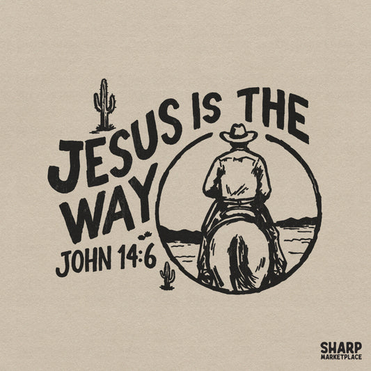 Distressed charcoal black ink design featuring a cowboy on horseback in a desert circle with the text Jesus Is The Way and John 14:6.