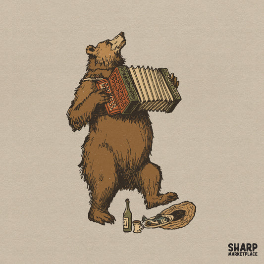 Vintage folk art illustration of a brown bear standing on hind legs playing an orange accordion, featuring a rustic woodland aesthetic for DIY projects.
