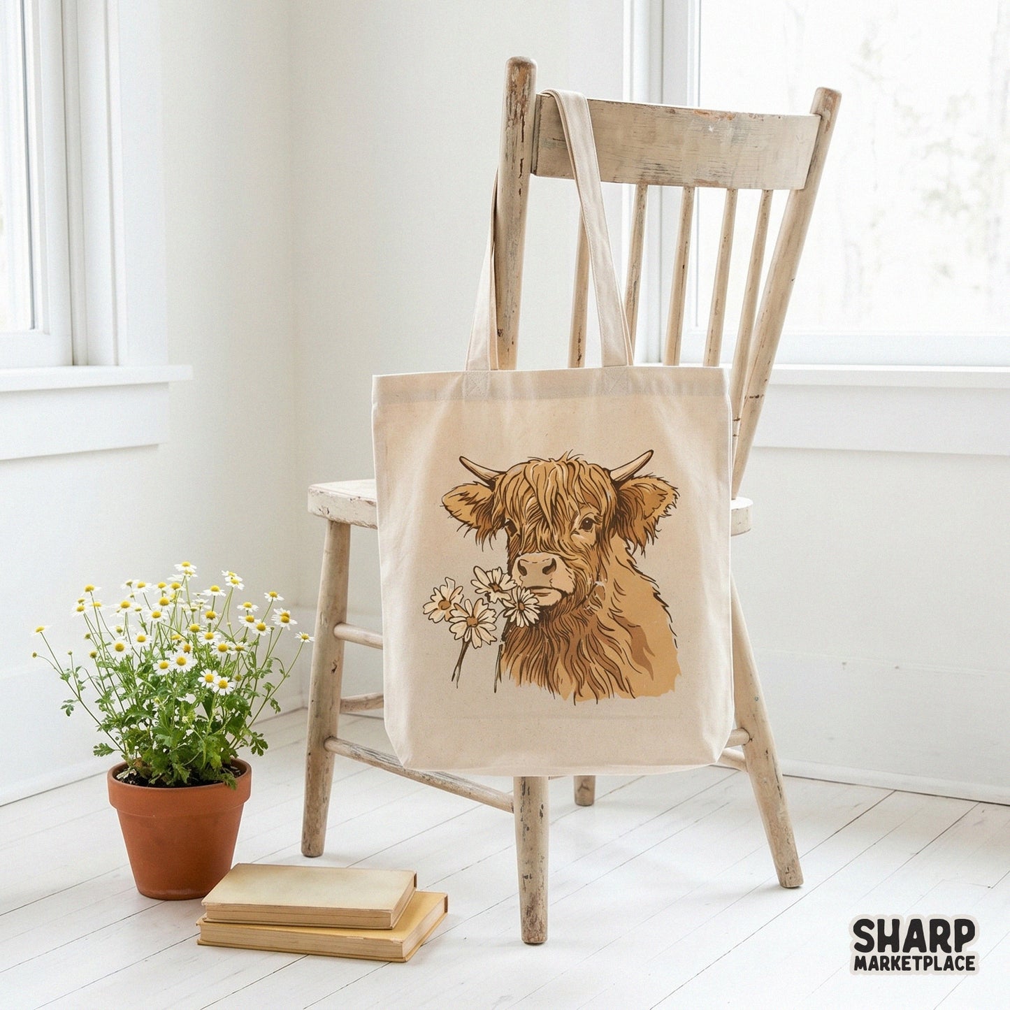 Tote bag mockup featuring a rustic Highland cow portrait with daisies, perfect for western-themed DIY projects and custom apparel.