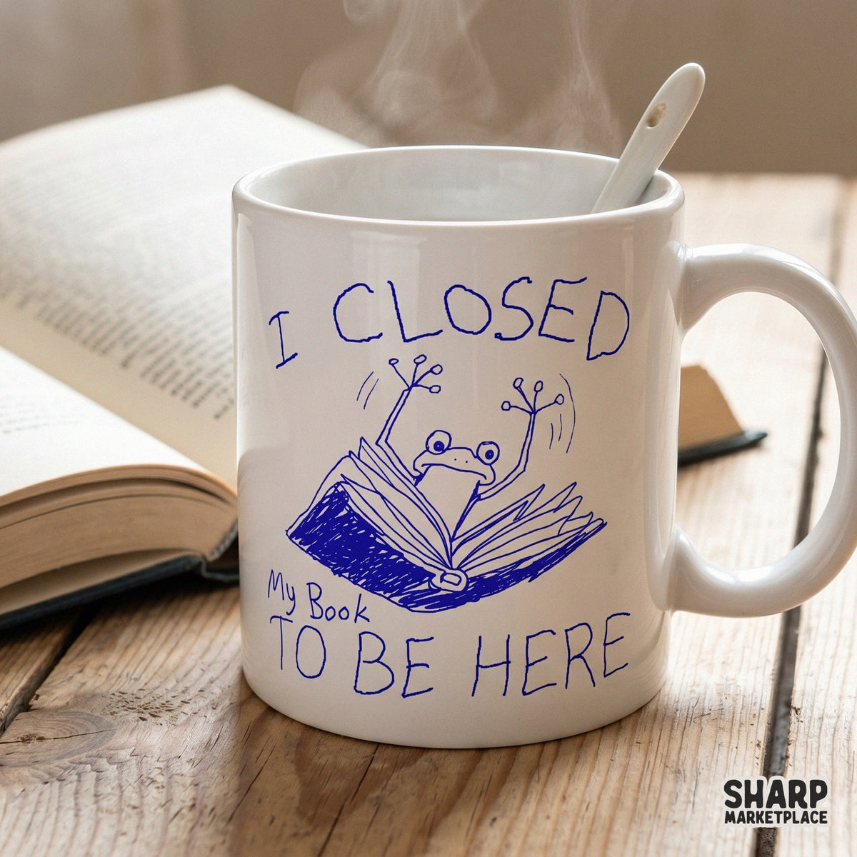 Whimsical frog reader digital illustration in a hand-drawn blue ink style, perfect for custom t-shirts, bookmarks, or reading-themed stickers.