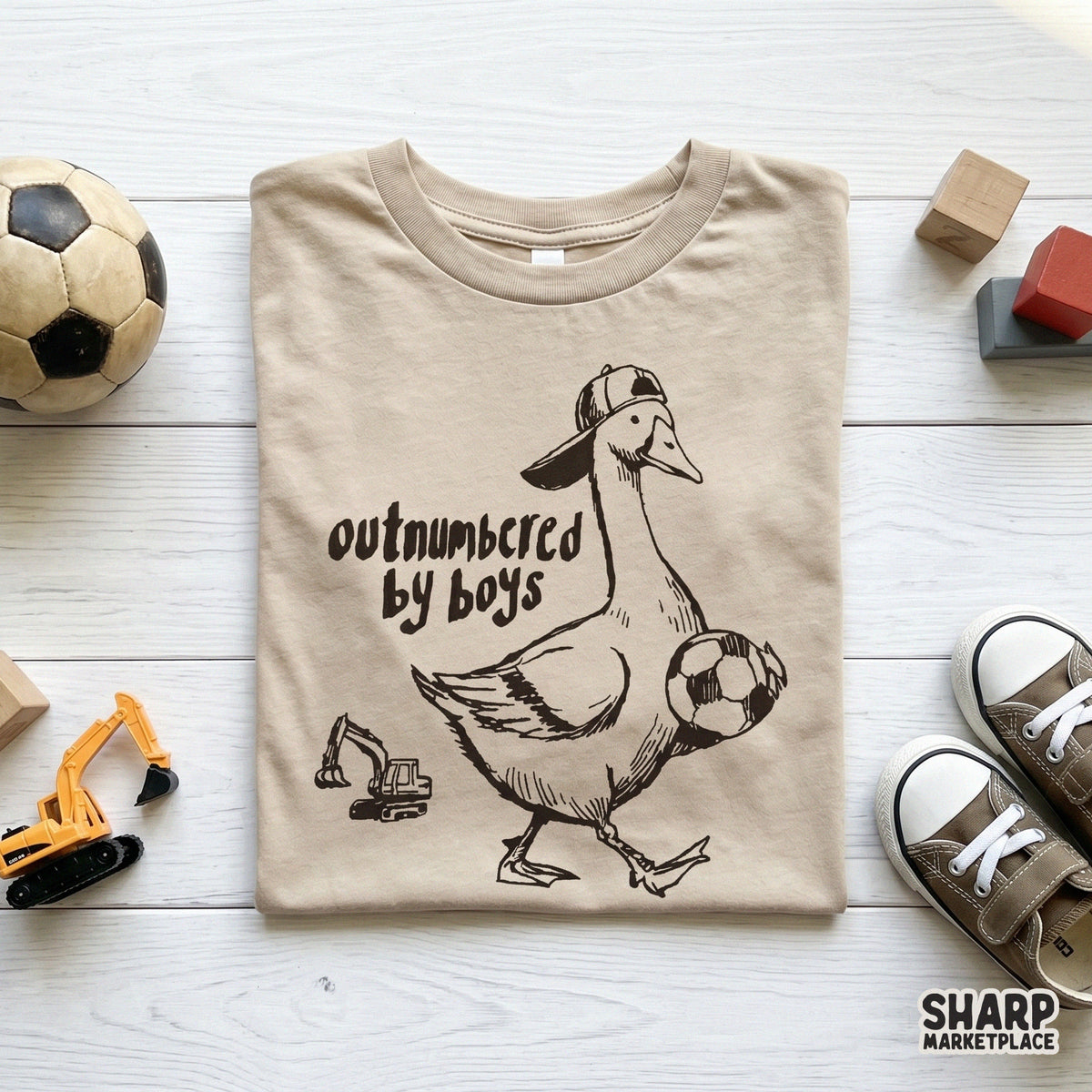 Whimsical goose illustration in a sketch art style with a soccer ball and toy tractor, ideal for creating funny family-themed apparel and accessories.