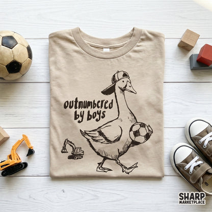 Whimsical goose illustration in a sketch art style with a soccer ball and toy tractor, ideal for creating funny family-themed apparel and accessories.